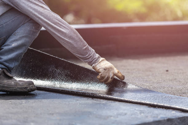 Professional Waterproofing technician working in New Baltimore, VA